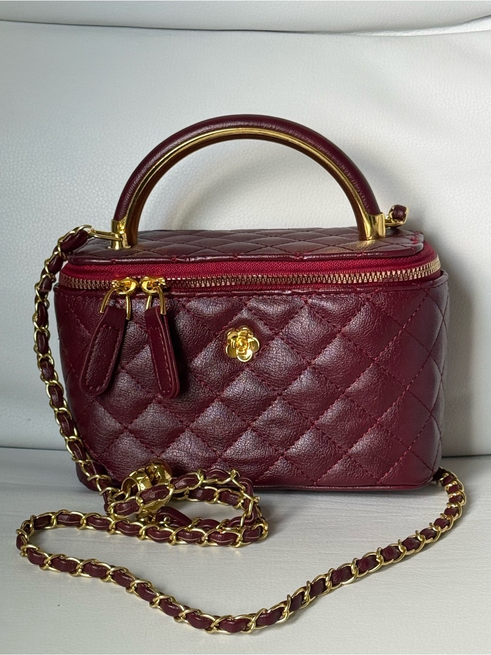 Quilted Burgundy Top-Handle vanity case styled Crossbody Bag with Gold Hardware
